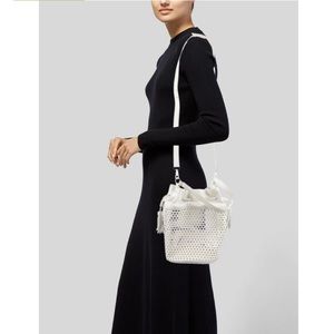 Loeffler Randall Leather bucket bag with cutouts. Handbag and crossbody option